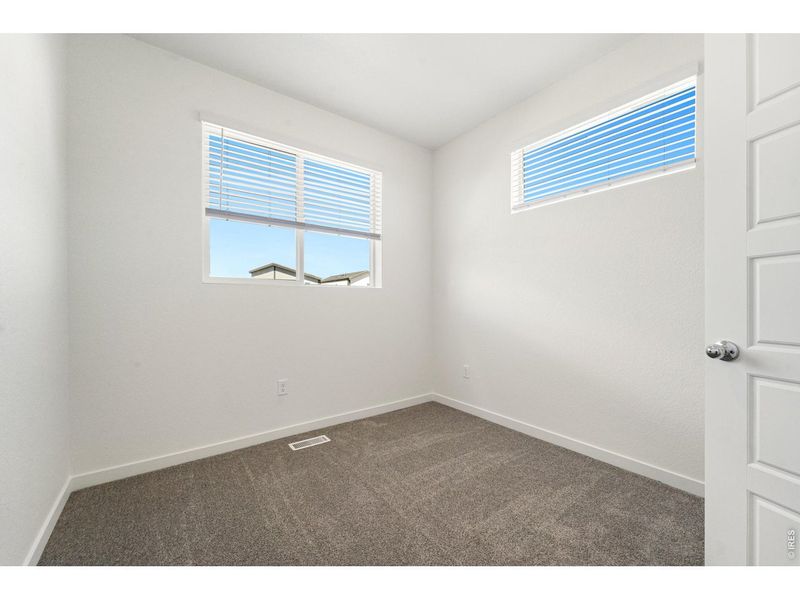 Spacious, unfurnished interior of a new home in Liberty Draw, Evans (Image 13).