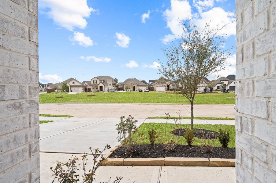 Exterior details and patio area of a home in Brookewater, Rosenberg (Image 30).