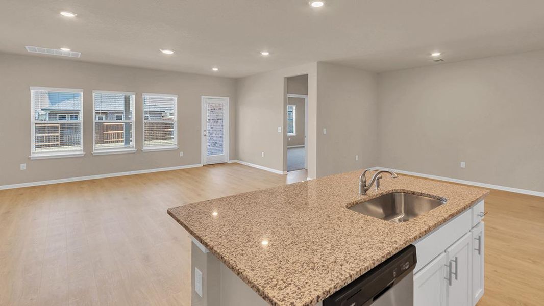 Furnished interior view inside a new home in Bar W Ranch, Leander (Image 3).
