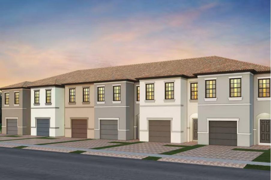 Front exterior of a new home in The Fields, Lake Worth, FL, highlighting curb appeal (Image 1). Front exterior of a new home in The Fields, Lake Worth, FL, highlighting curb appeal (Image 1).