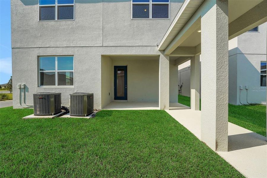Front exterior of a new home in Crossroads at Kelly Park, Apopka, FL, highlighting curb appeal (Image 15).