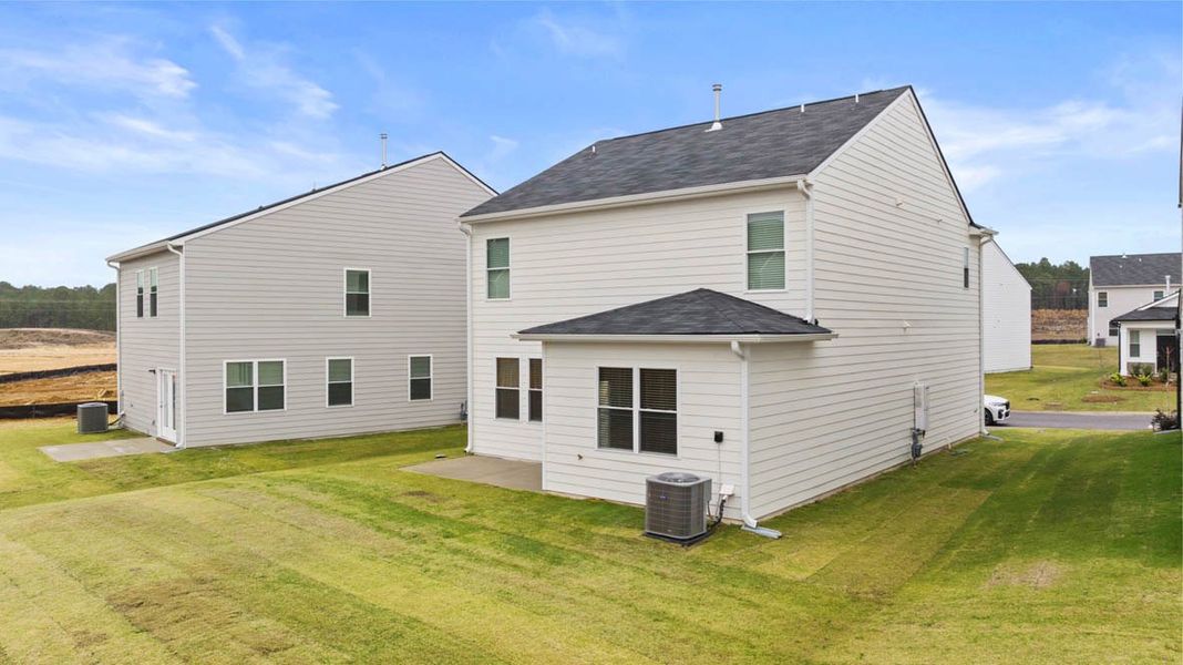 Front exterior of a new home in The Abbey at Trolley Run Station, Aiken, SC, highlighting curb appeal (Image 19).