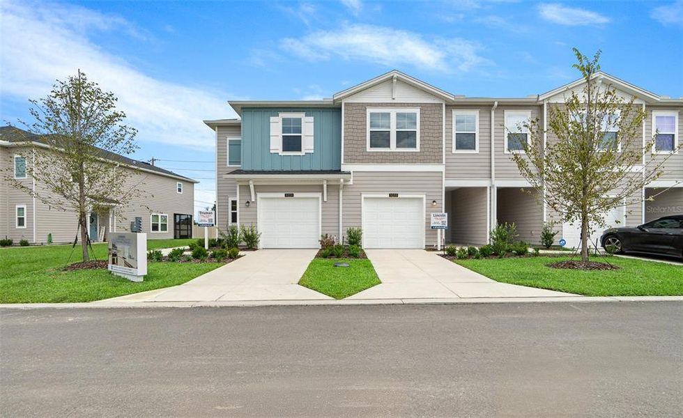 Front exterior of a new home in , Ocala, FL, highlighting curb appeal (Image 23). Front exterior of a new home in , Ocala, FL, highlighting curb appeal (Image 23).