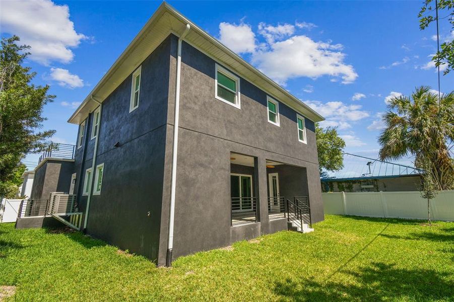 Front exterior of a new home in , Tampa, FL, highlighting curb appeal (Image 18). Front exterior of a new home in , Tampa, FL, highlighting curb appeal (Image 18).