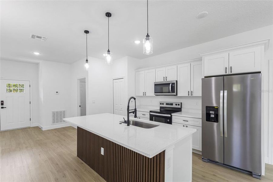 Furnished interior view inside a new home in , Dunnellon (Image 9).