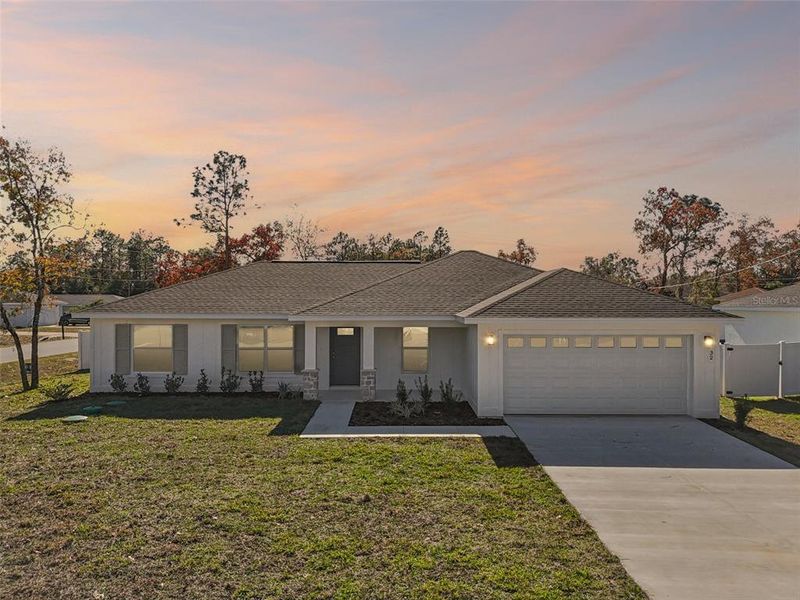 Front exterior of a new home in , Ocala, FL, highlighting curb appeal (Image 23). Front exterior of a new home in , Ocala, FL, highlighting curb appeal (Image 23).
