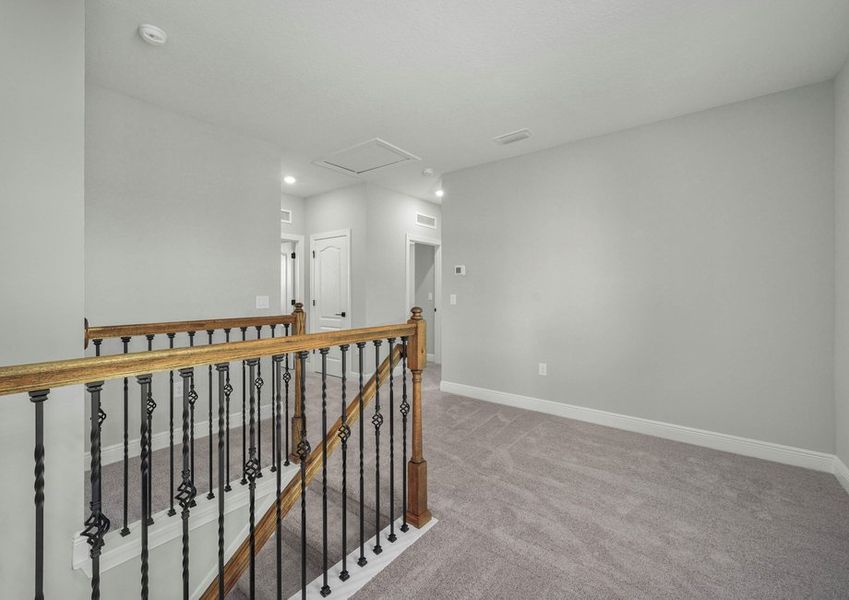 The loft on the second floor is a great space for a game room or office.