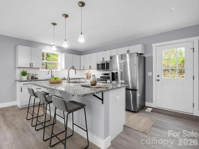 Furnished interior view inside a new home in , Rosman (Image 6). Furnished interior view inside a new home in , Rosman (Image 6).