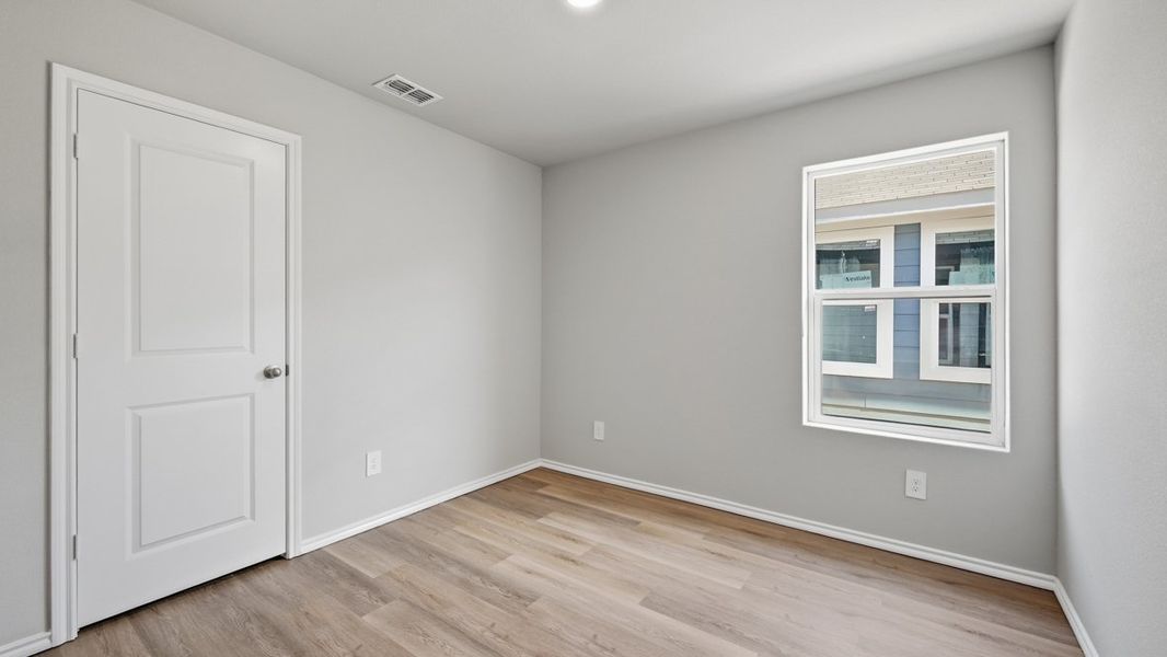 Representative unfurnished interior of a home built from the Estero by D.R. Horton in Hickory Grove, Krum (Image 32).
