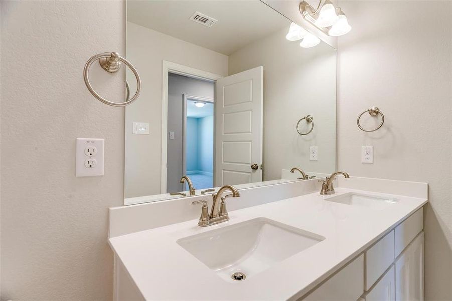 Bathroom featuring vanity