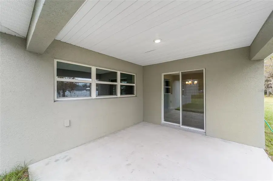 Exterior details and patio area of a home in , Ocala (Image 3). Exterior details and patio area of a home in , Ocala (Image 3).