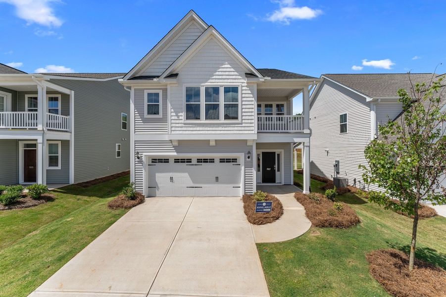 Front exterior of a new home in Landmark Commons, Boiling Springs, SC, highlighting curb appeal (Image 1). Front exterior of a new home in Landmark Commons, Boiling Springs, SC, highlighting curb appeal (Image 1).