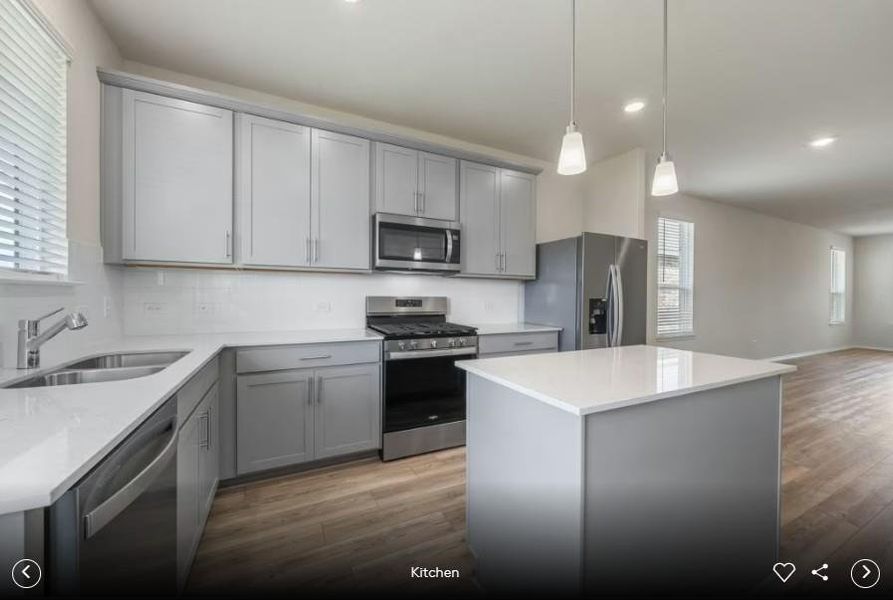 Interior photos- Photo of Pulte model home with same floor plan, not of actual home listed.