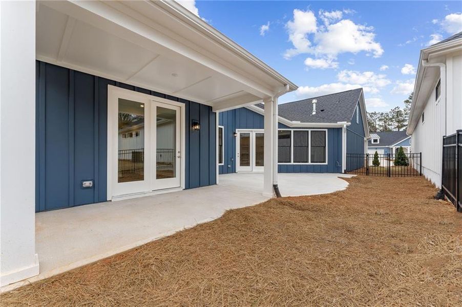 Exterior details and patio area of a home in The Courtyards at Redbud Lane, Holly Springs (Image 3). Exterior details and patio area of a home in The Courtyards at Redbud Lane, Holly Springs (Image 3).