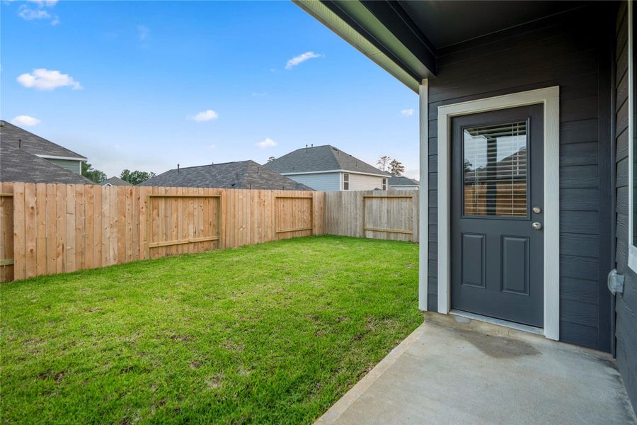 Exterior details and patio area of a home in , Conroe (Image 25). Exterior details and patio area of a home in , Conroe (Image 25).