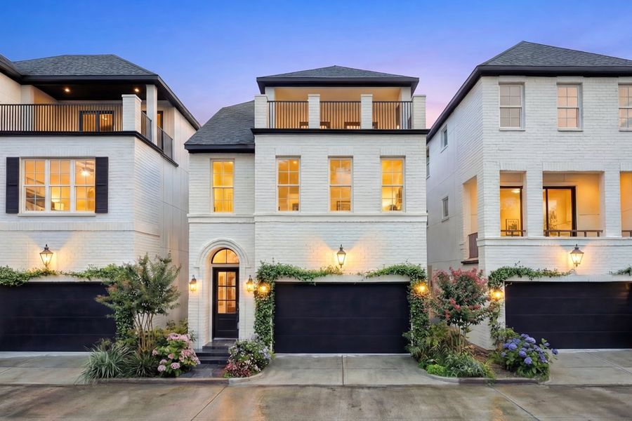 Front exterior of a new home in Cottage Grove Lake Phase 2, Houston, TX, highlighting curb appeal (Image 1). Front exterior of a new home in Cottage Grove Lake Phase 2, Houston, TX, highlighting curb appeal (Image 1).