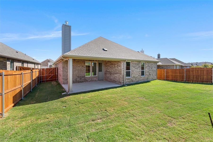 Exterior details and patio area of a home in Morningstar, Aledo (Image 20).