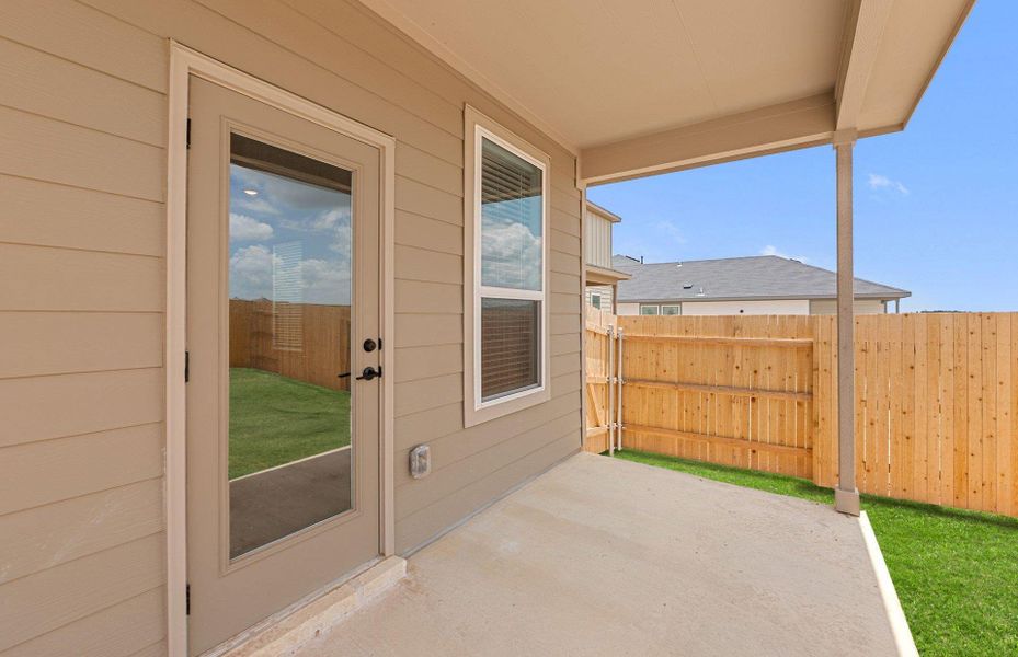 Exterior details and patio area of a home in Sunfield, Buda (Image 21).