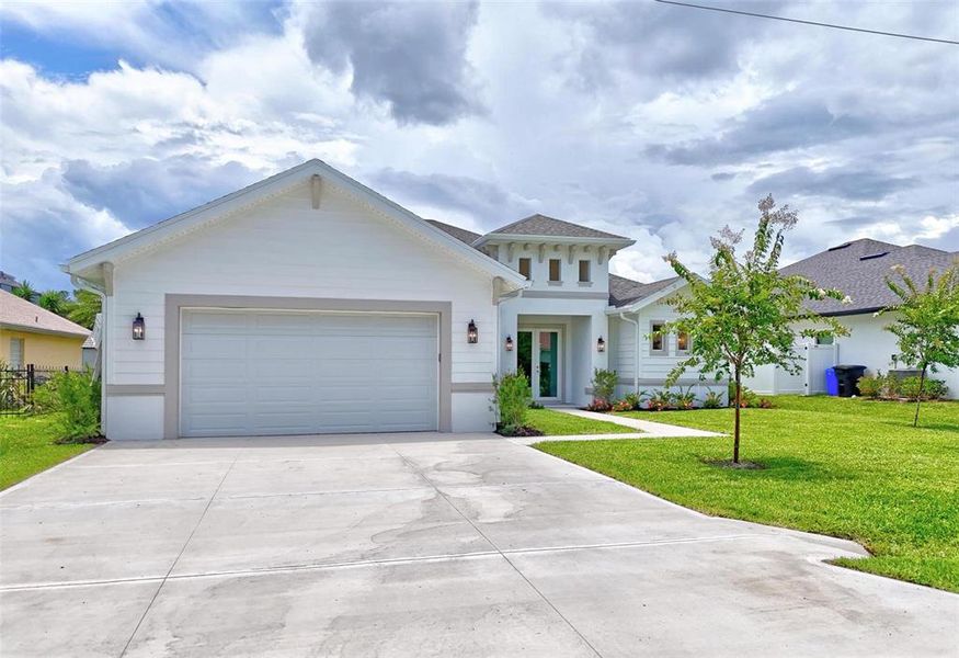 Front exterior of a new home in , Palm Coast, FL, highlighting curb appeal (Image 25).