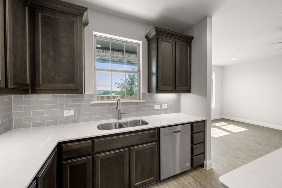 Representative exterior photo of a completed home built from the Brownwood by Impression Homes in Main Street Village, Mansfield, TX (Image 11). Representative exterior photo of a completed home built from the Brownwood by Impression Homes in Main Street Village, Mansfield, TX (Image 11).