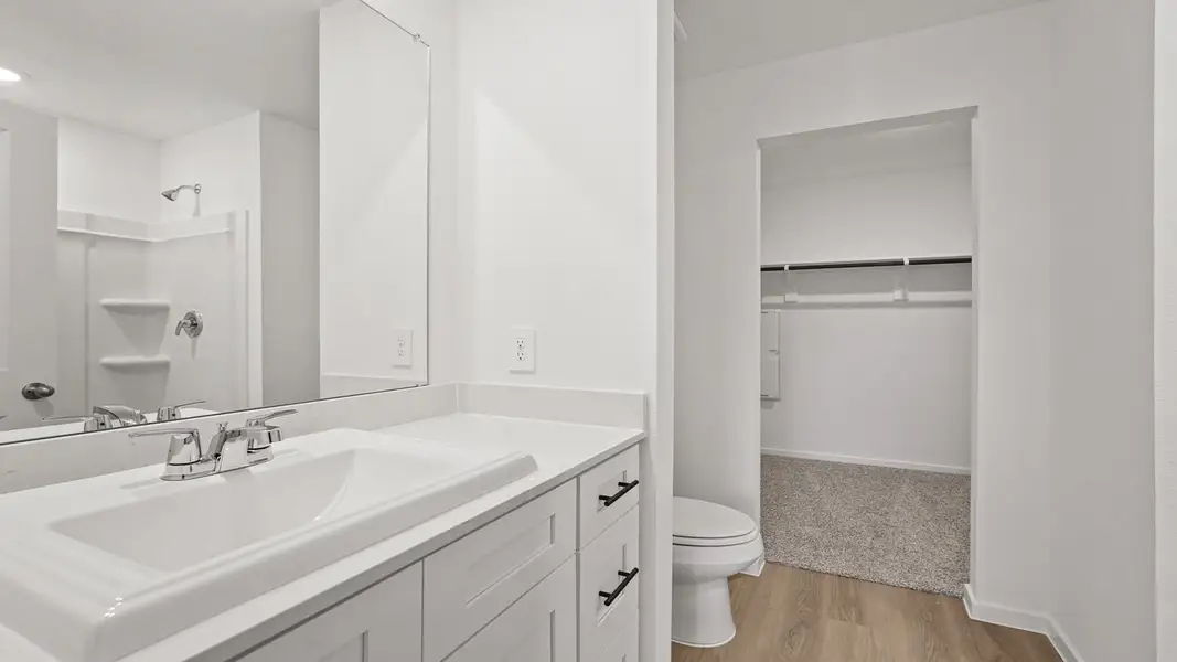 Furnished interior view inside a new home in Sunterra, Katy (Image 7).