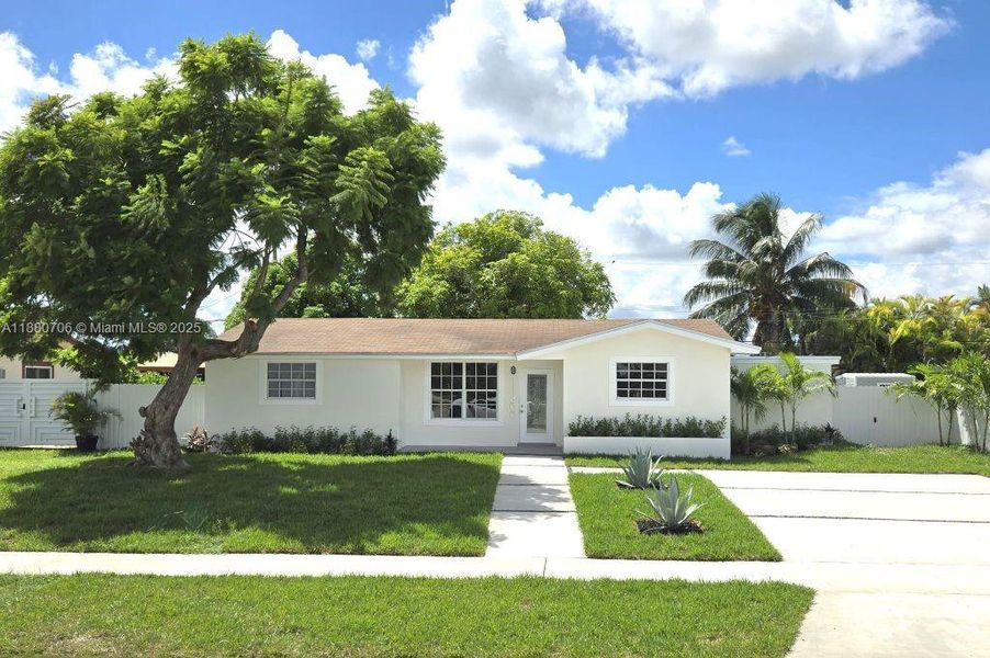 Front exterior of a new home in , Miami, FL, highlighting curb appeal (Image 22). Front exterior of a new home in , Miami, FL, highlighting curb appeal (Image 22).