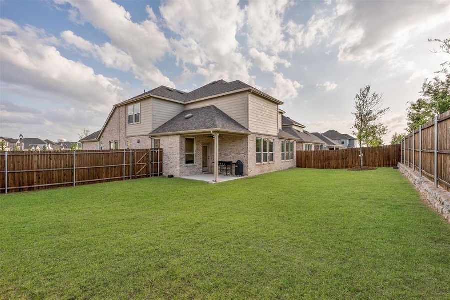 Exterior details and patio area of a home in Erwin Farms, McKinney (Image 3).