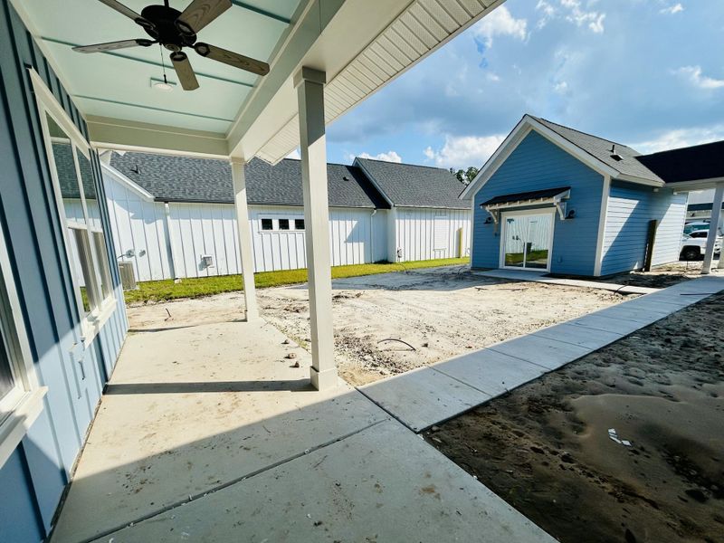 Exterior details and patio area of a home in The Domus Collection at Midtown Nexton, Summerville (Image 32).