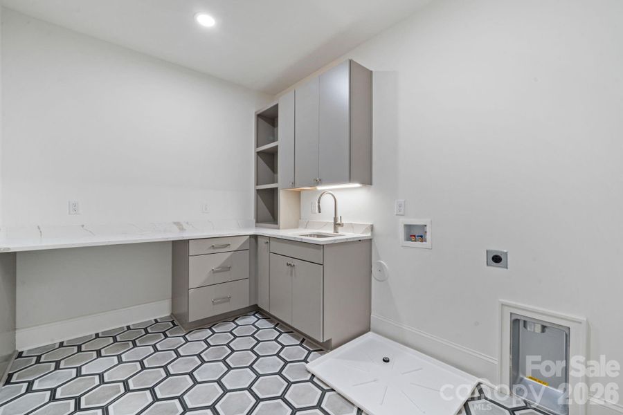 Large laundry room on upper level