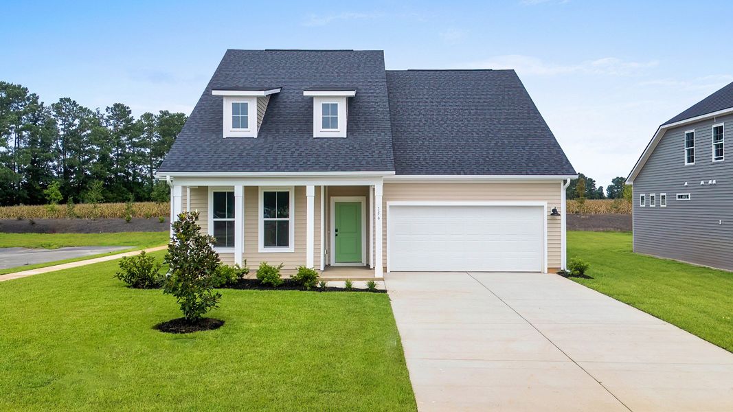 Avondale Elevation 4 at Chestnut Farms in Longs, SC showcasing charming dormers, front porch, and two-car garage Avondale Elevation 4 at Chestnut Farms in Longs, SC showcasing charming dormers, front porch, and two-car garage