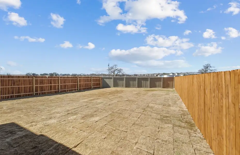 Exterior details and patio area of a home in Santa Rita Ranch, Liberty Hill (Image 4).