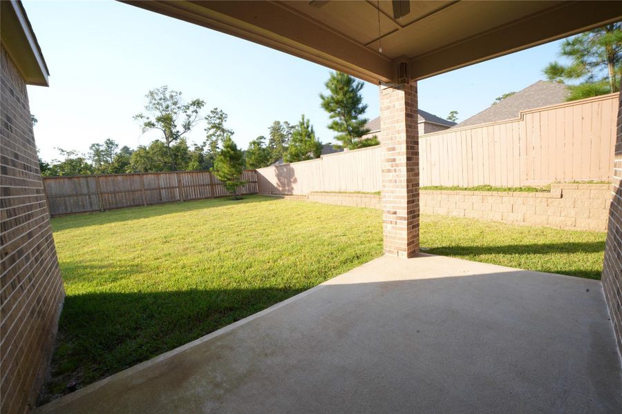 Exterior details and patio area of a home in Wedgewood Forest, Conroe (Image 16). Exterior details and patio area of a home in Wedgewood Forest, Conroe (Image 16).