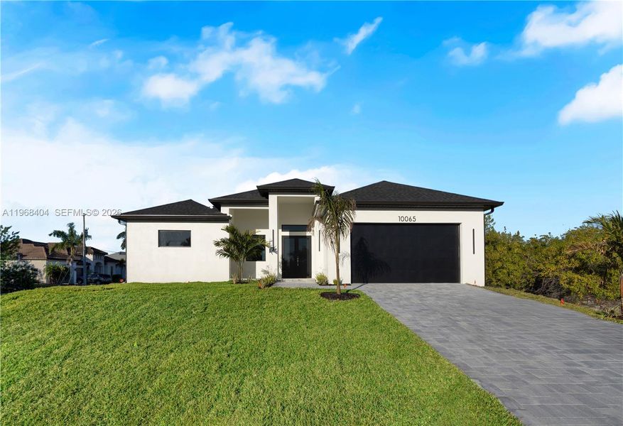 Front exterior of a new home in , Port Charlotte, FL, highlighting curb appeal (Image 27).