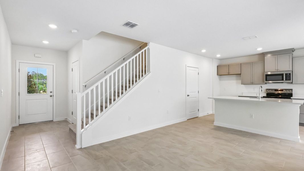 Furnished interior view inside a new home in Cyrene at Harmony, St. Cloud (Image 6).