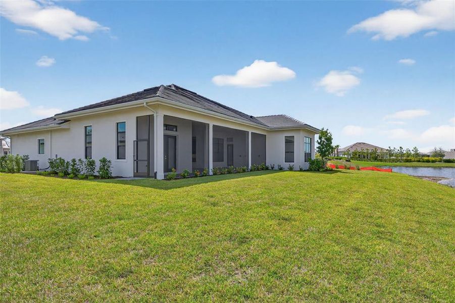 Exterior details and patio area of a home in , Sarasota (Image 27).