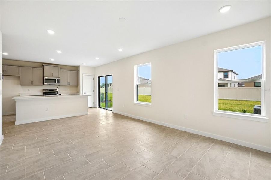Spacious, unfurnished interior of a new home in Grasslands West, Lakeland (Image 34).