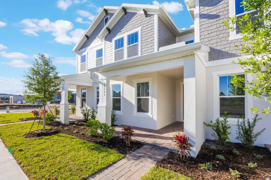 Representative exterior details of a home built from the Edison by Rockwell Homes in Harvest at Ovation - Townhomes, Winter Garden (Image 54).