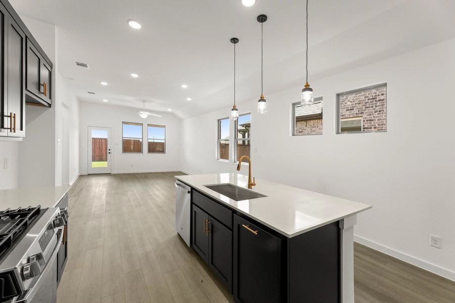 Open Kitchen-Living-Dining Room Representative Photo featuring the Noir Collection