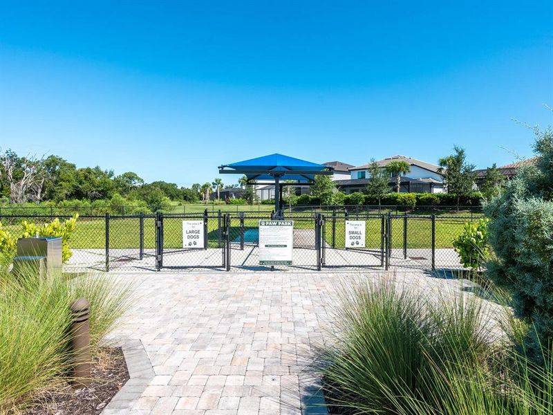 Front exterior of a new home in , Lakewood Ranch, FL, highlighting curb appeal (Image 27).