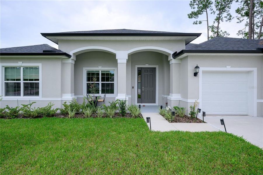 Exterior details and patio area of a home in , Palm Coast (Image 22).