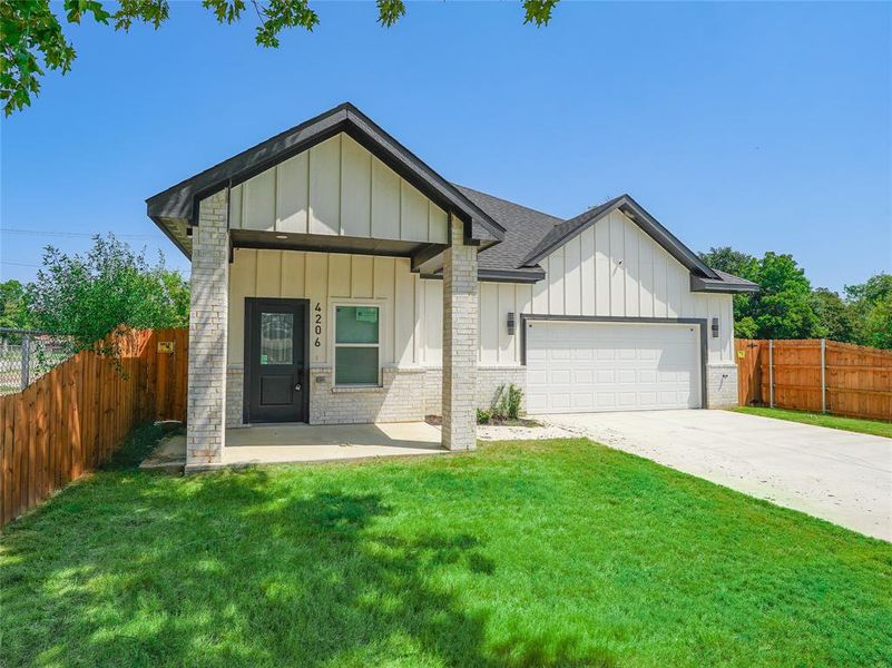 Front exterior of a new home in , Dallas, TX, highlighting curb appeal (Image 17).