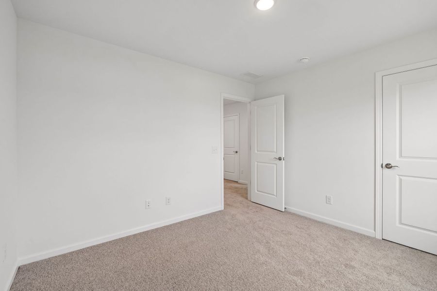 Spacious, unfurnished interior of a new home in Highlands of Carter's Station, Columbia (Image 28).