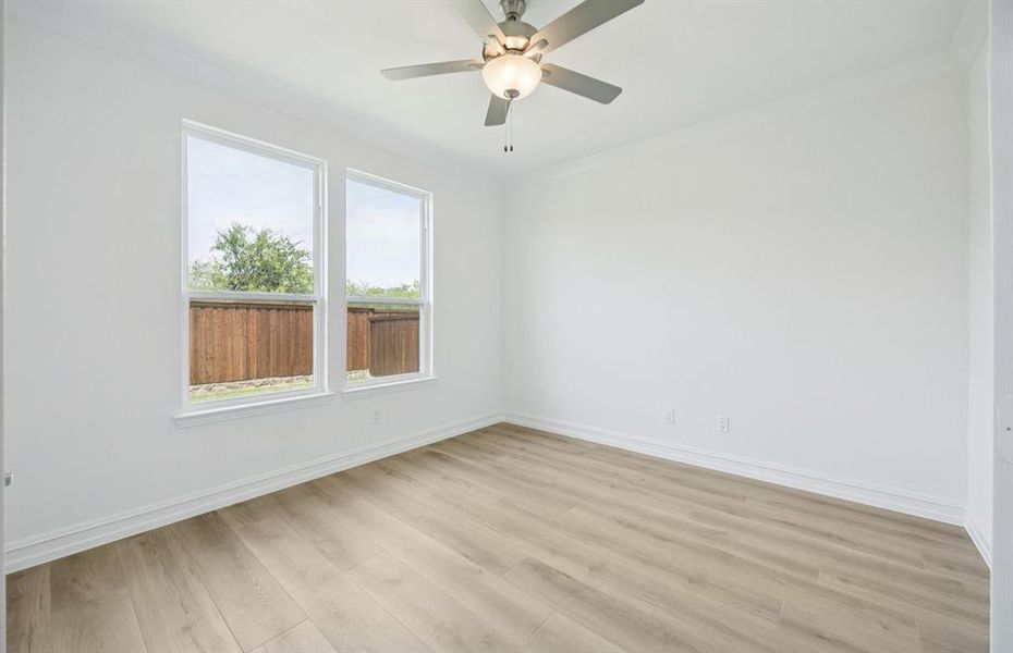 Dining nook off kitchen with large windows Dining nook off kitchen with large windows