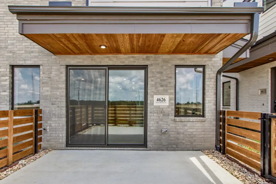 Exterior details and patio area of a home in Wildridge, Oak Point (Image 4).