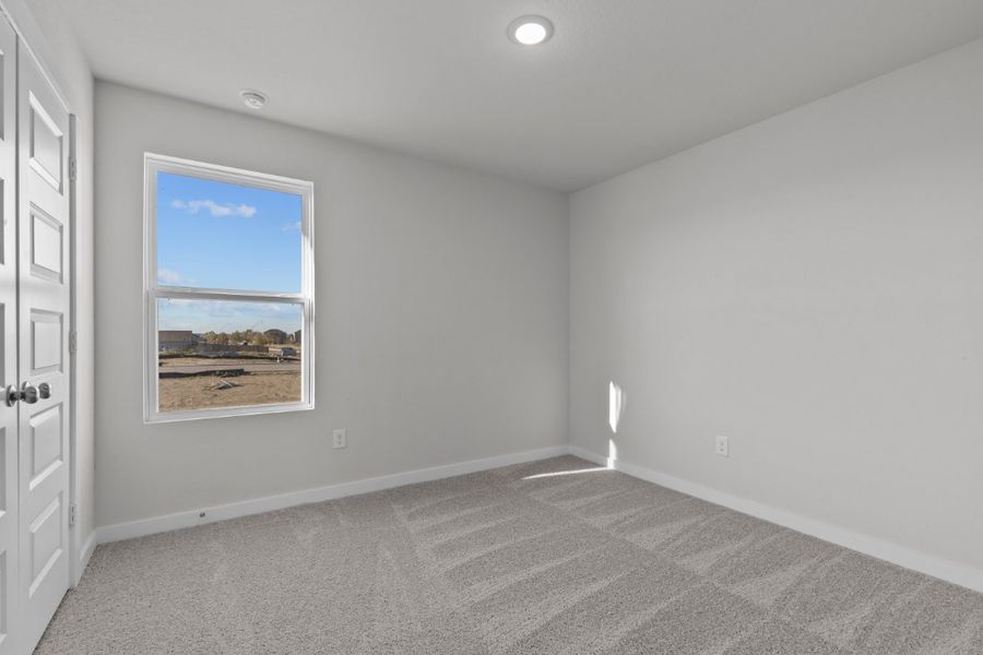 A room with a large window.