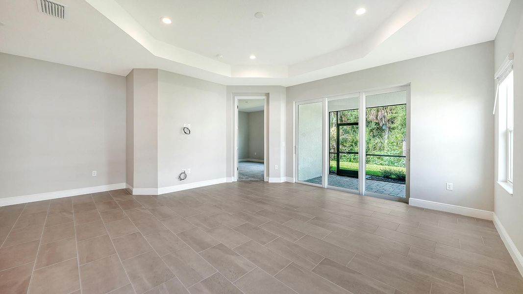 Spacious, unfurnished interior of a new home in Wildleaf Real Estate and Homes for Sale in Parrish, FL - Neal Communities, Parrish (Image 26).