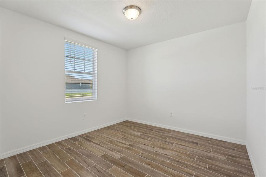 Spacious, unfurnished interior of a new home in Lawson Dunes - Signature Series, Haines City (Image 30).