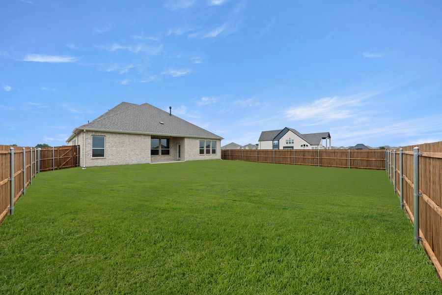 Exterior details and patio area of a home in Park Trails, Forney (Image 23).