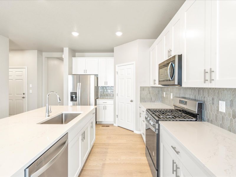 The Snowberry floorplan interior image taken at a Meritage Homes community in Brighton, CO.