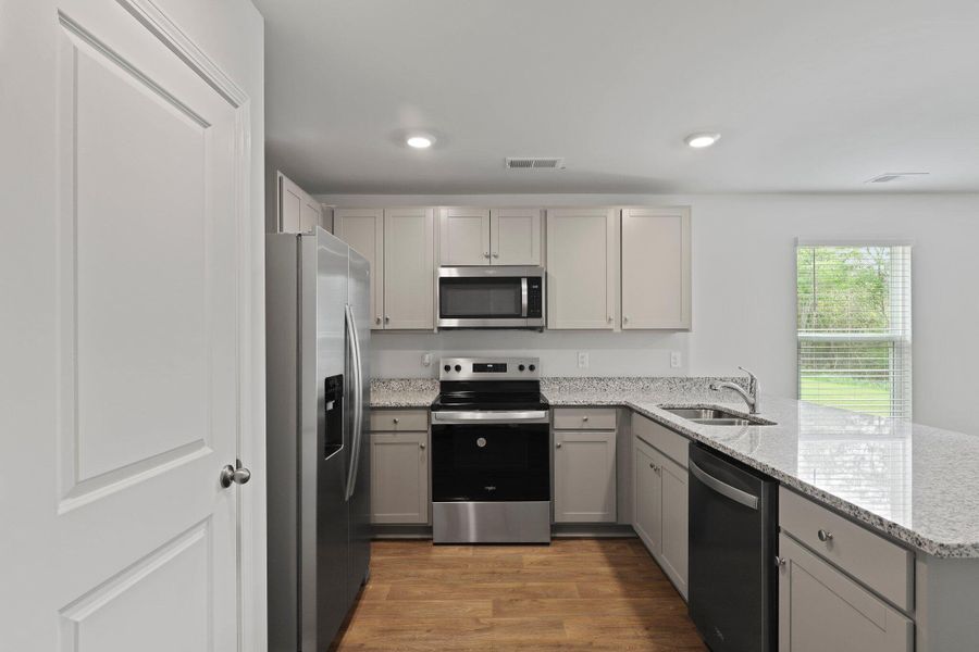 Furnished interior view inside a new home in Center Pointe, Santee (Image 2).